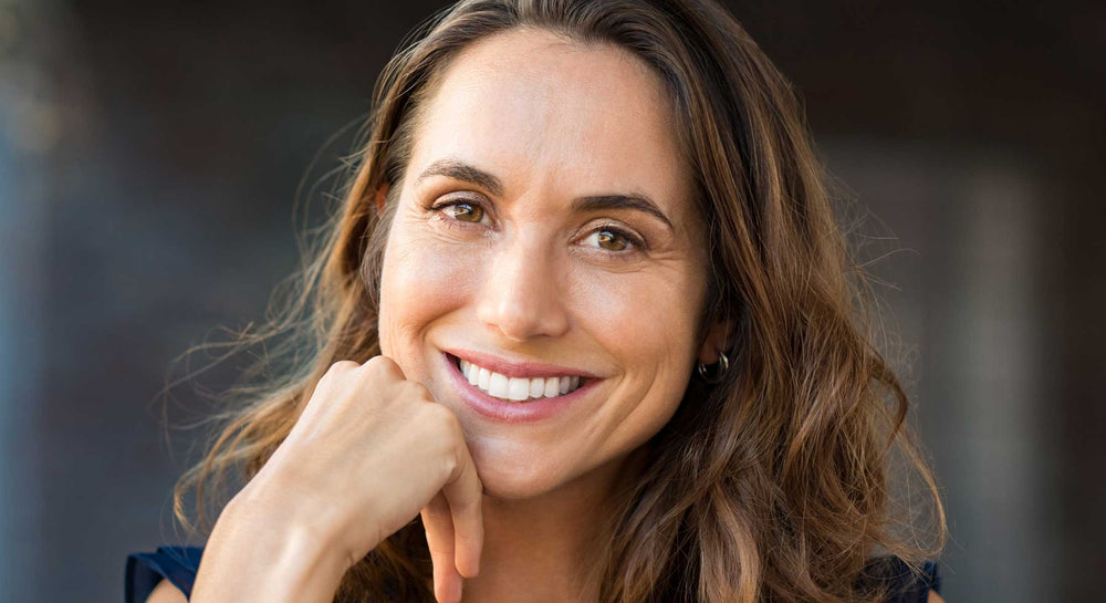 Smiling woman with healthy, radiant skin